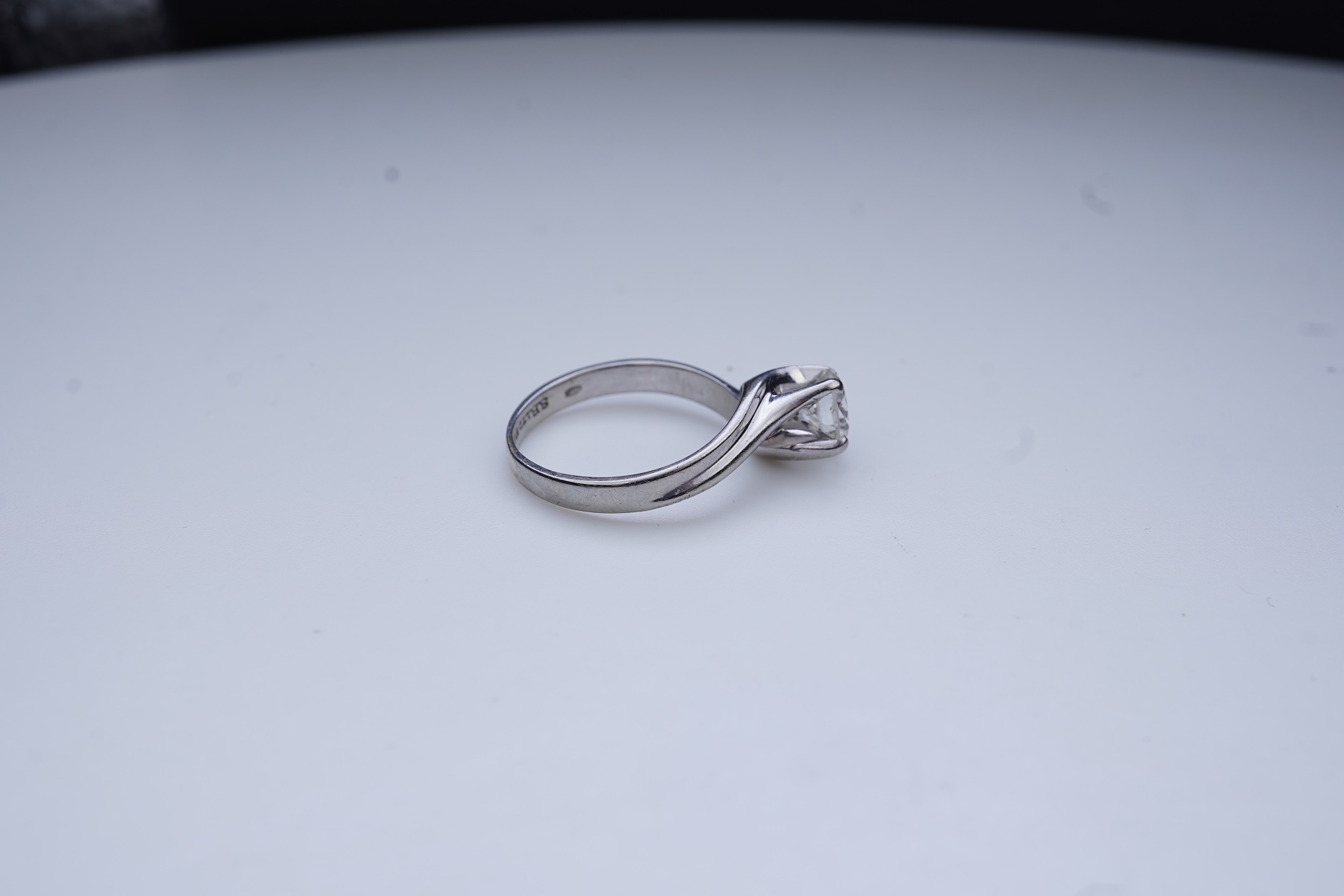 A diamond solitaire ring
